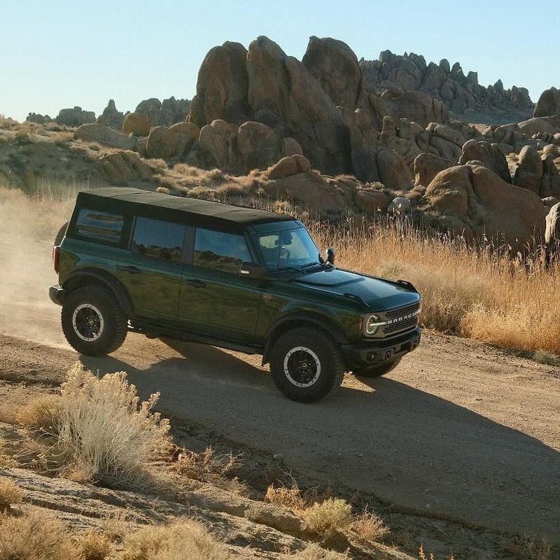 Green Bronco on a dirt road in the Alabama Hills. Photo by Andrew Crow