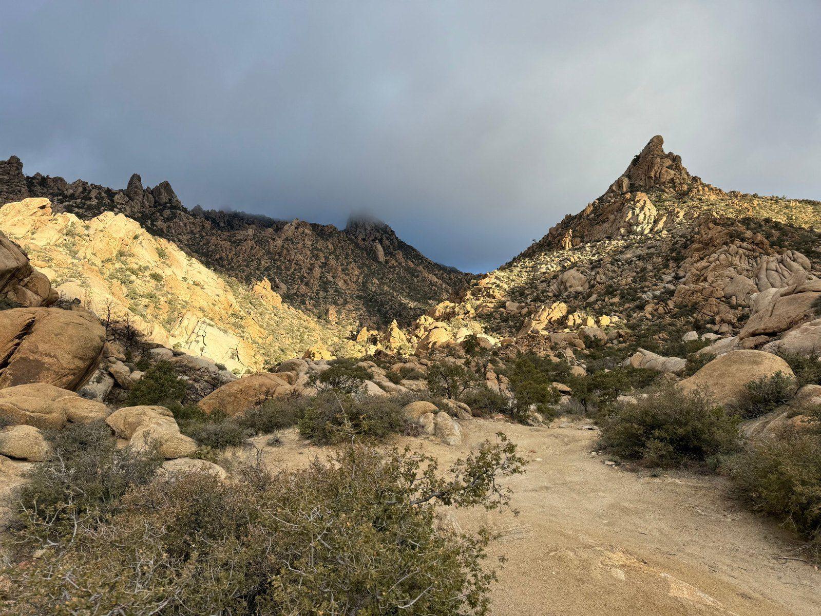 Granite peaks under storm light
