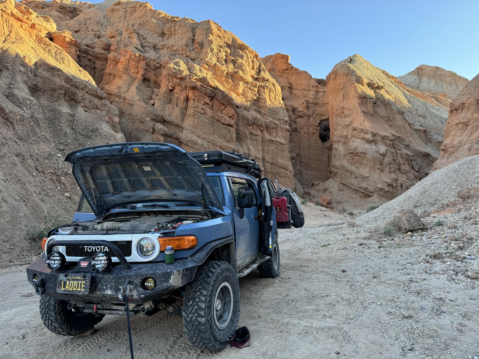 The FJ with the hood up at camp in Afton Canyon