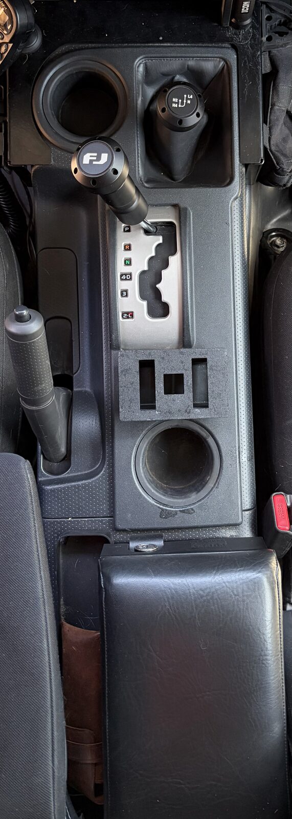 The final bezel design installed with both switches in
