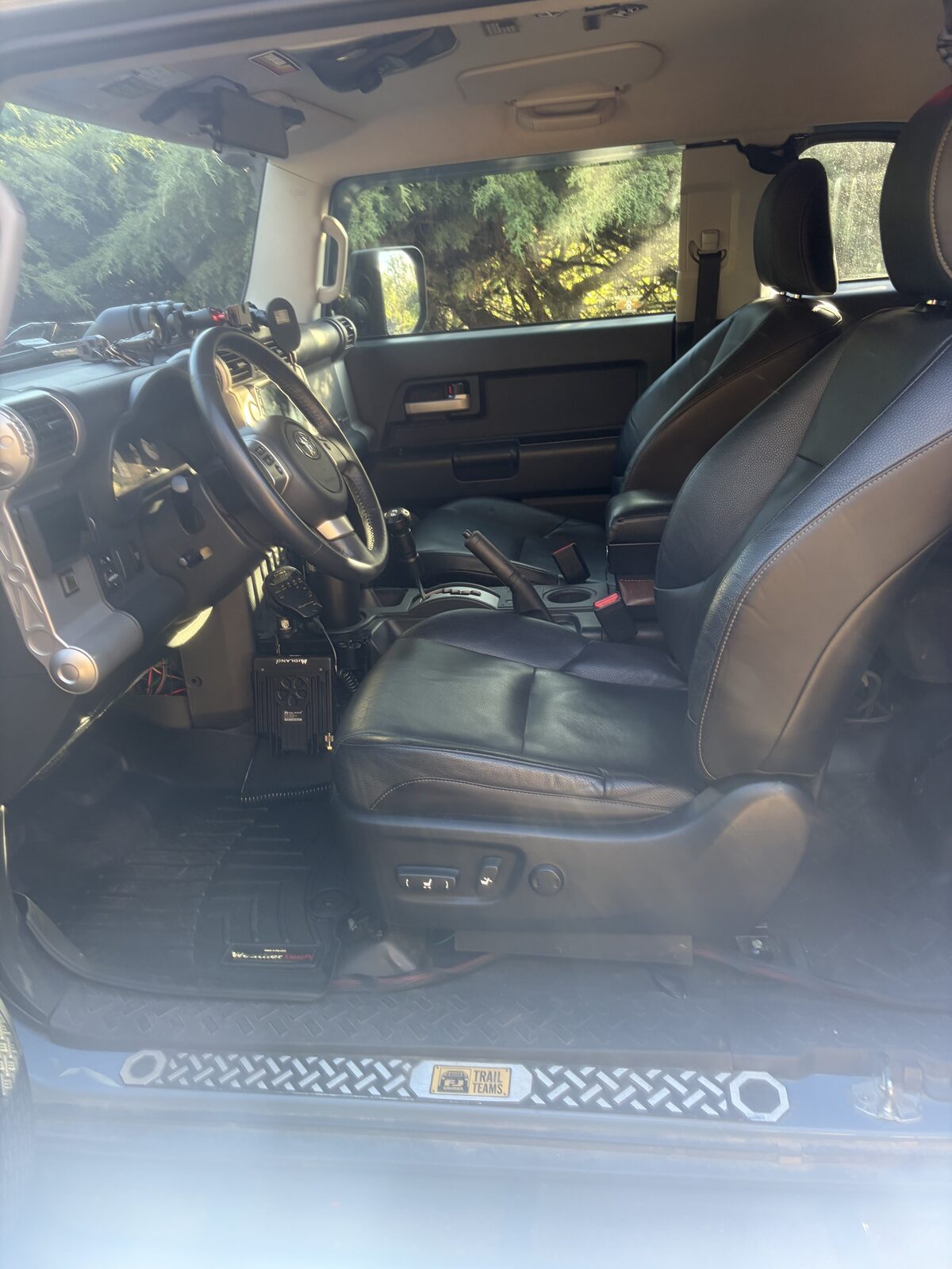 The driver seat installed, door open
