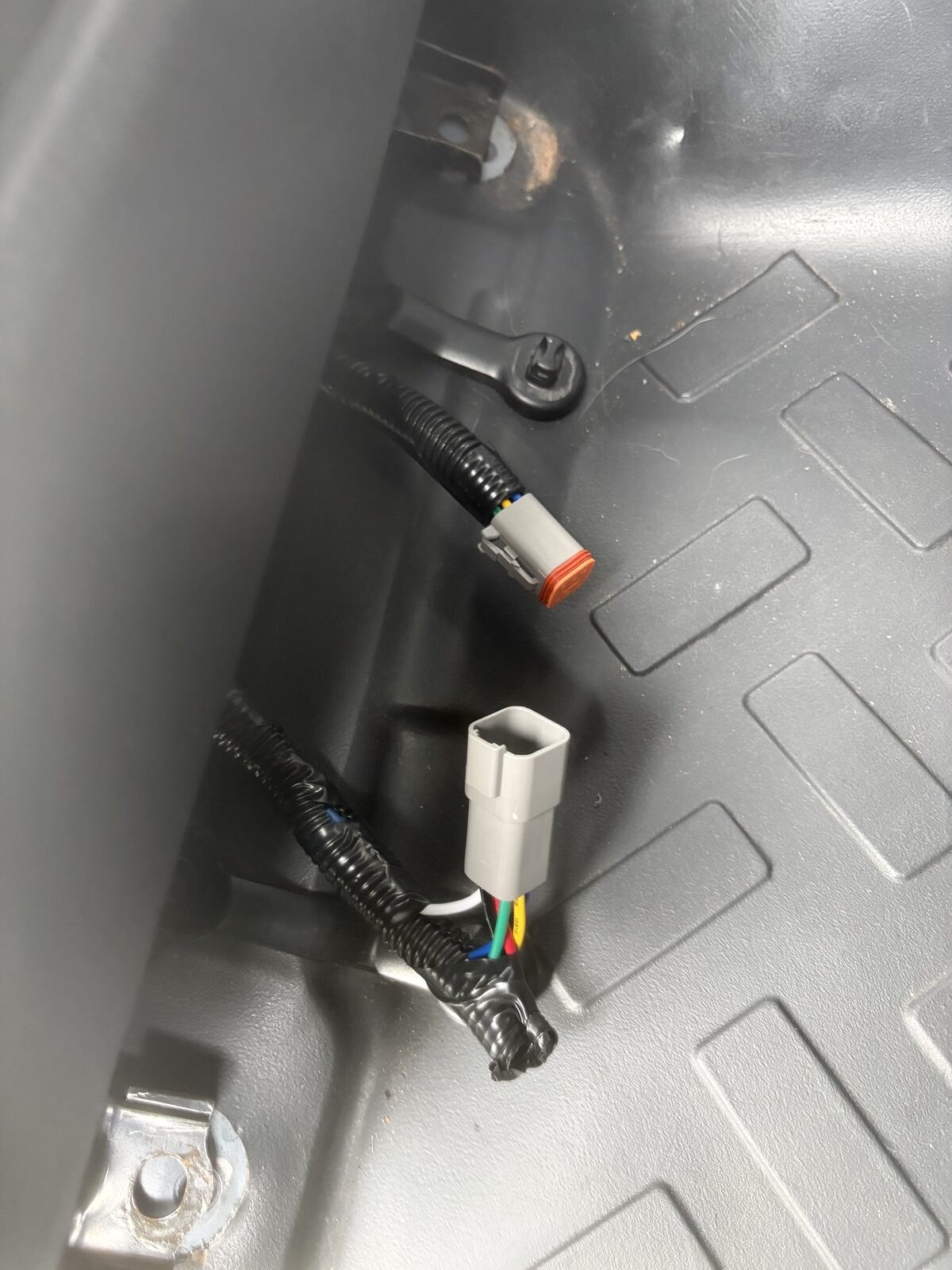 The Deutsch DT 6-way disconnect under the seat