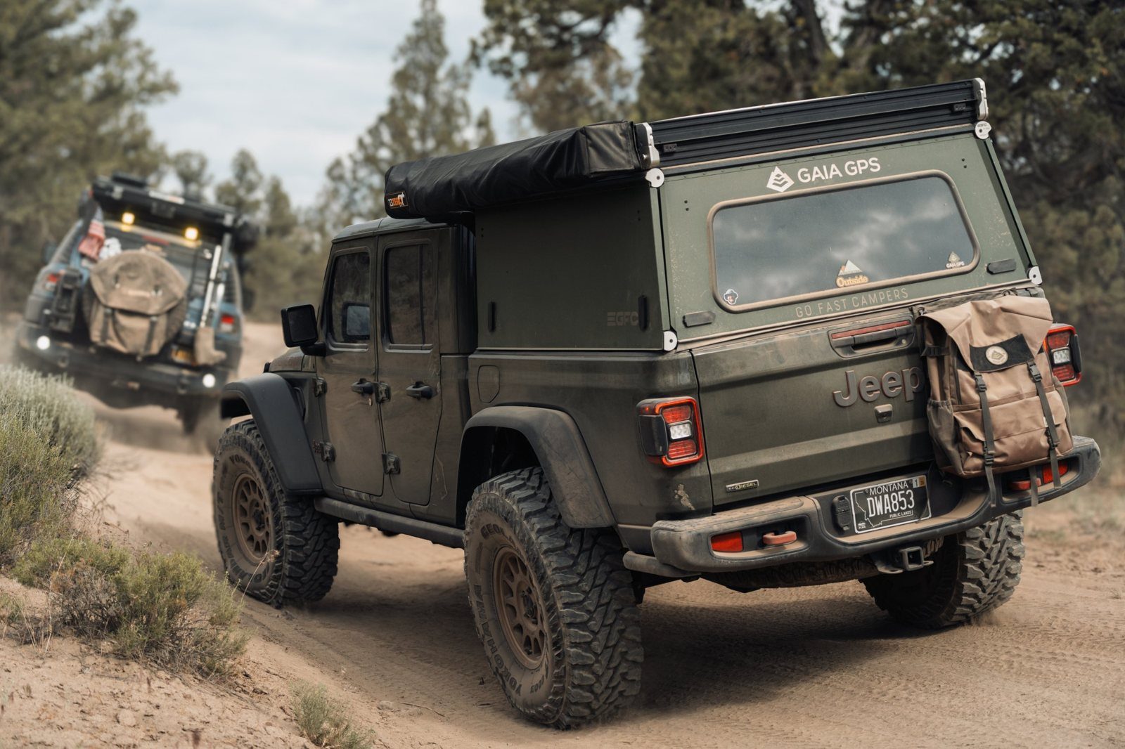 Gladiator with a GFC camper, Trooper behind