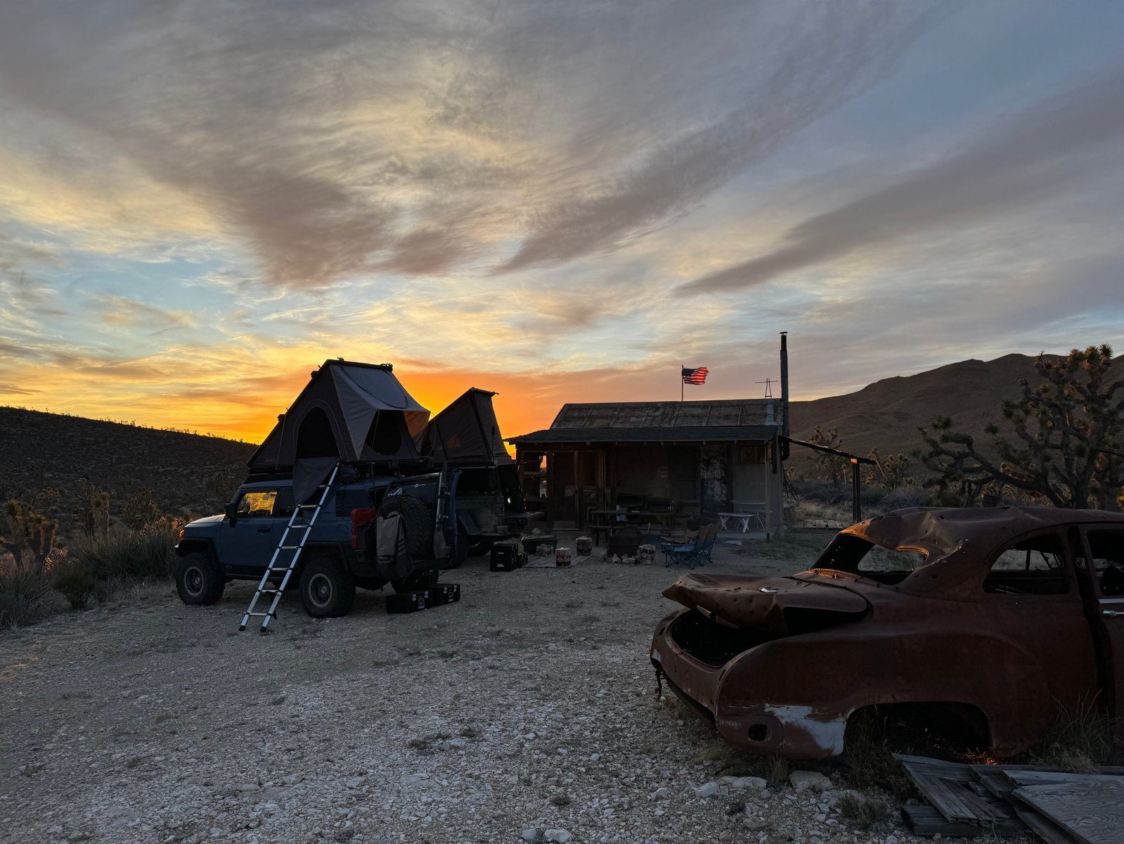Camp at a Mojave cabin at sunset
